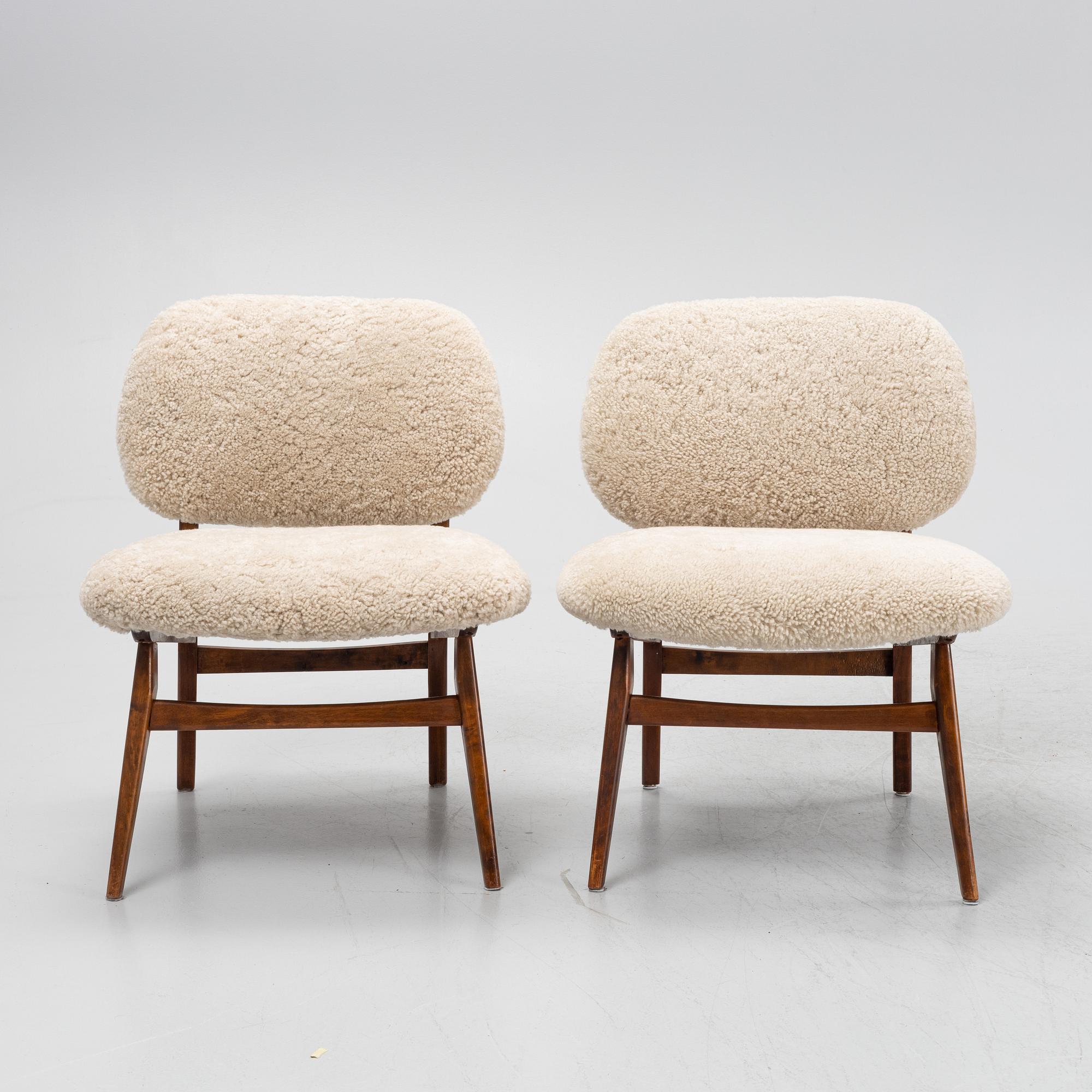 A pair of mid 20th century lounge chairs.