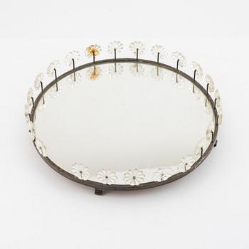 Estrid Ericson, a mirrored brass surtout de table from Firma Svenskt Tenn.