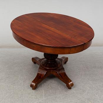 A late Empire Dinner table, 19th century.