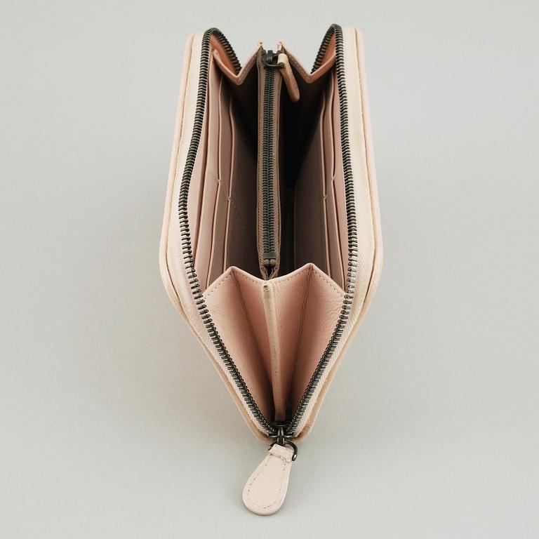 BOTTEGA VENETA, a intrecciato leather wallet.