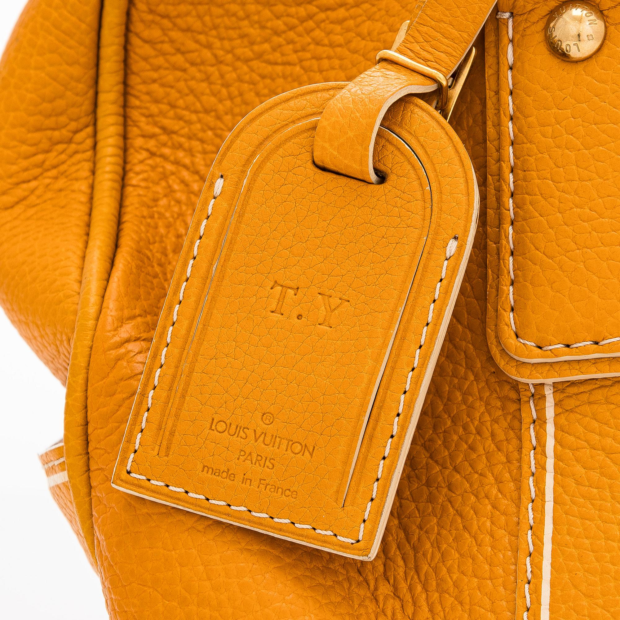 Louis Vuitton, a 'Tobago Carryall' bag.
