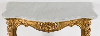 A gilt wood mirror and marble top console table, early 20th Century.