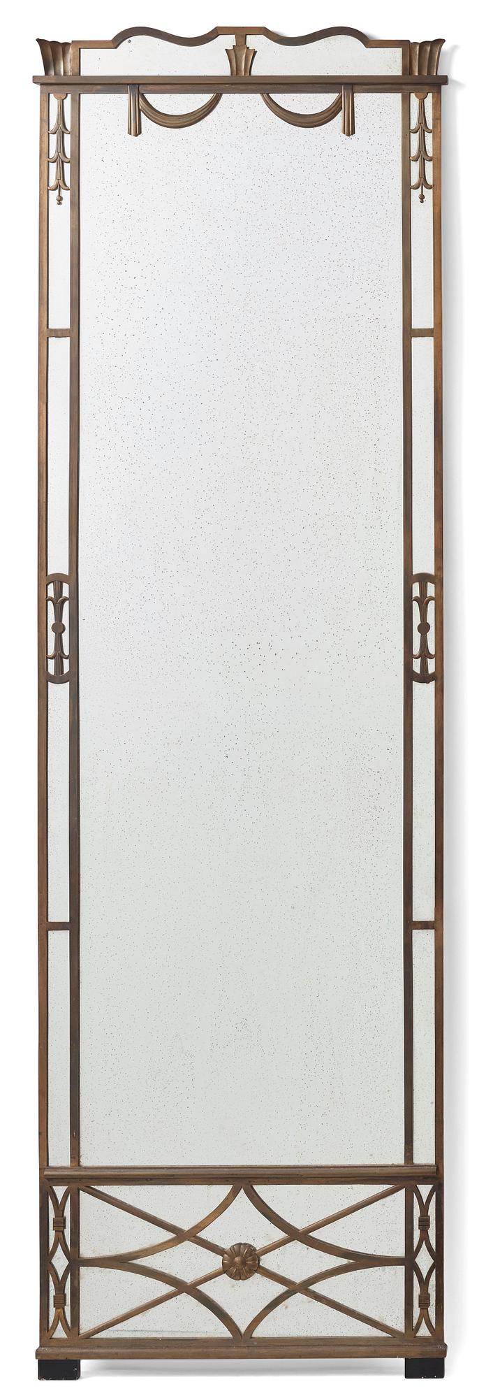 Swedish Grace, a brass framed wall mirror, 1920-30s.
