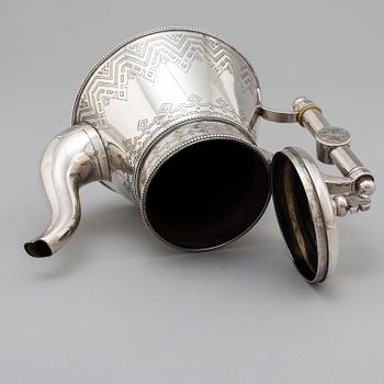 A Russian 19th century parcel-gilt silver tea pot and cream jug, mark possbly of Alexander Lokin, St. Petersburg 1893.
