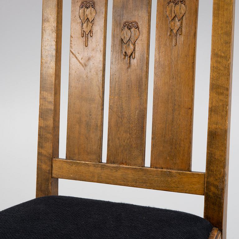 Carl Westman, attributed, a pair of stained birch wood chairs. Early 20th century.