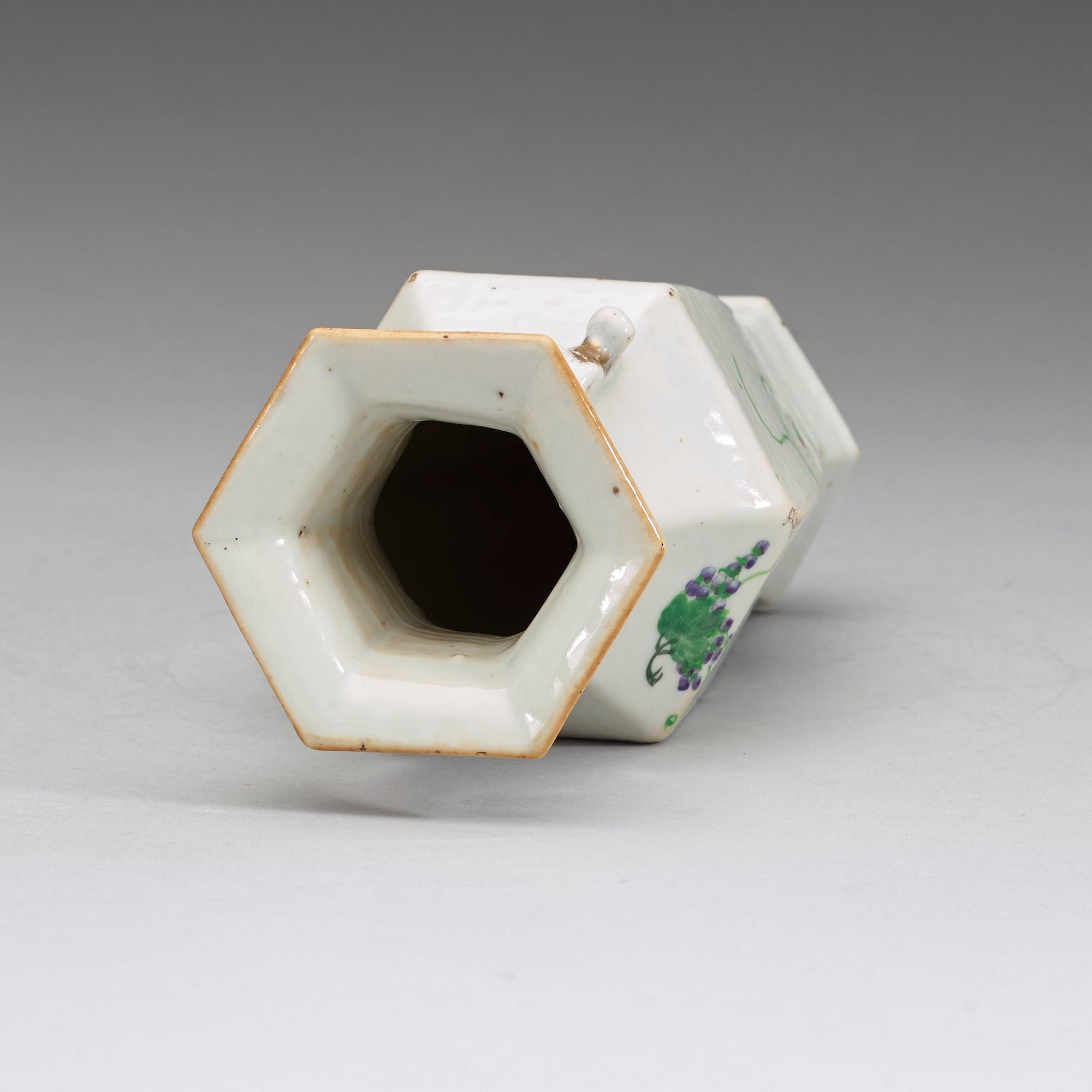 A hexagonal vase enameled with flowers and calligraphy, Republic era (1912-1949).
