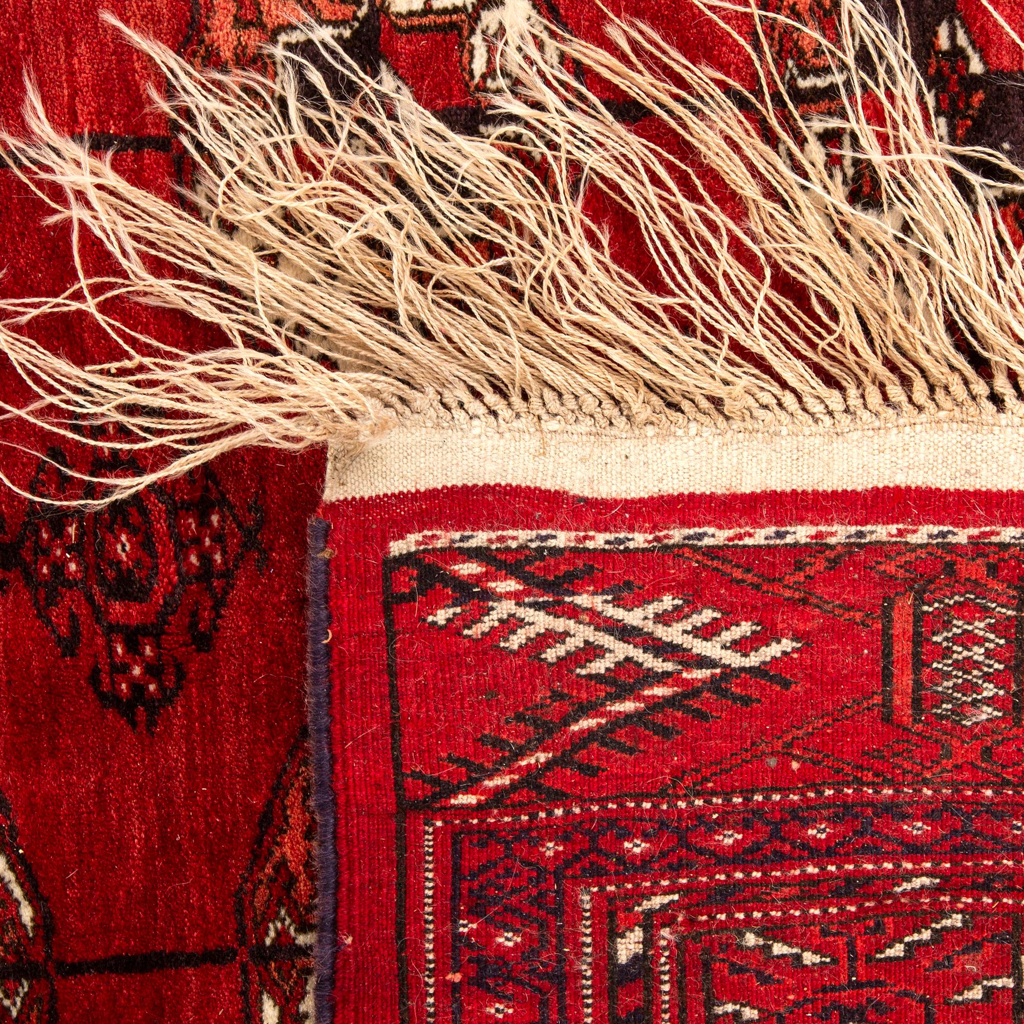 A semiantique Bochara carpet ca 282 x 200 cm.
