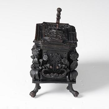 A South-German, presumably Nuremberg, Baroque iron and steel strongbox, later part of the 17th century.