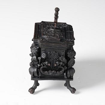 A South-German, presumably Nuremberg, Baroque iron and steel strongbox, later part of the 17th century.