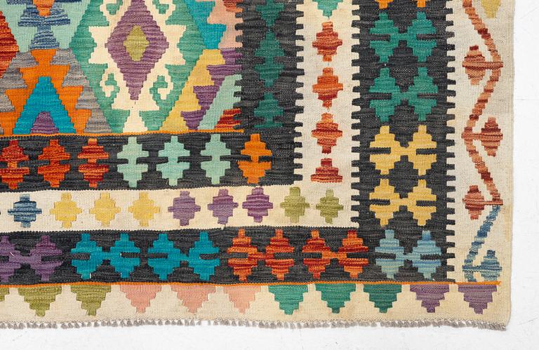 An, Afghan kilim carpet, c. 496 x 319 cm.