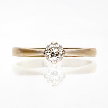Diamondring 18K whitegold 1 brilliant-cut diamond 0,30 ct inscribed W/TCR VVS, valuation letter Gemmologica AB Stockholm.