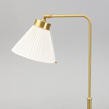 Josef Frank, a model 1842 brass floor light for Firma Svenskt Tenn.