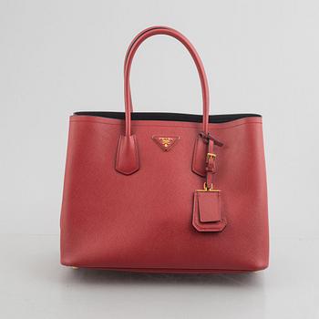 Prada, A red Saffiano Tote Bag.