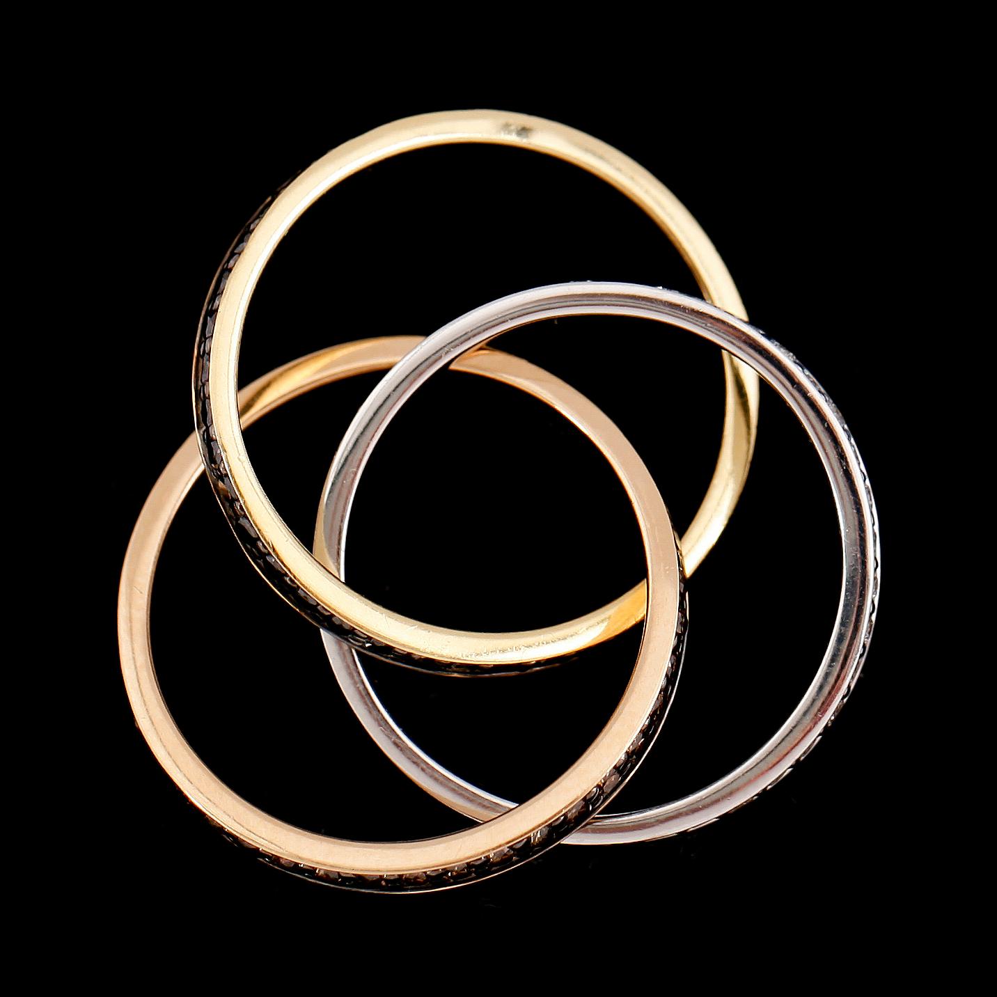 RING, tredelad, 18 k rött, vitt och roséguld, diamanter totalt 1.44 ct.