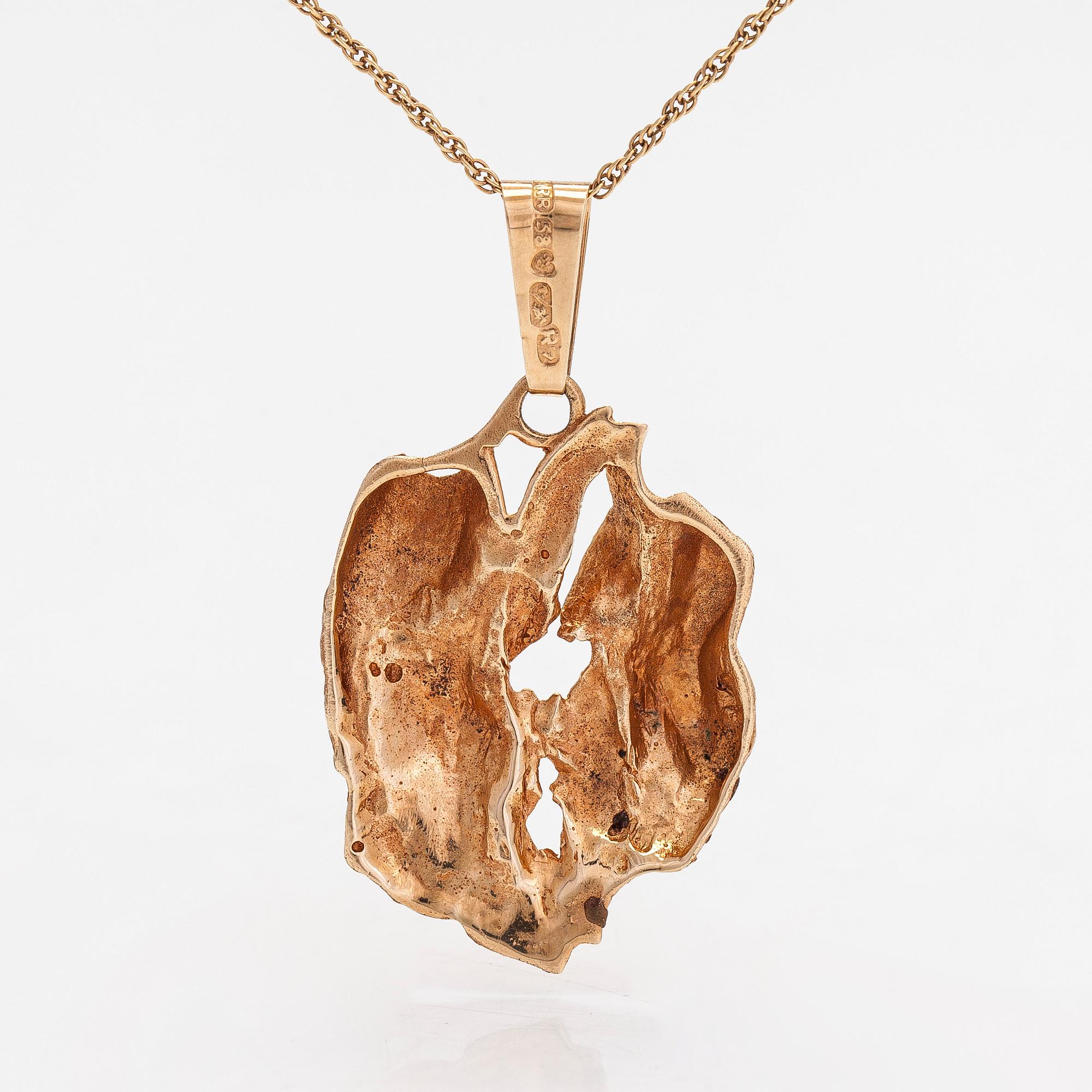 A 14K gold pendant, Sammon Sepät, Tampere 1970 with chain.