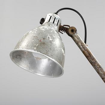 GOLVLAMPA, metall, "Essde-lampan", Bröderna Johansson auto-metall, Skellefteå, omkr 1900-talets mitt.