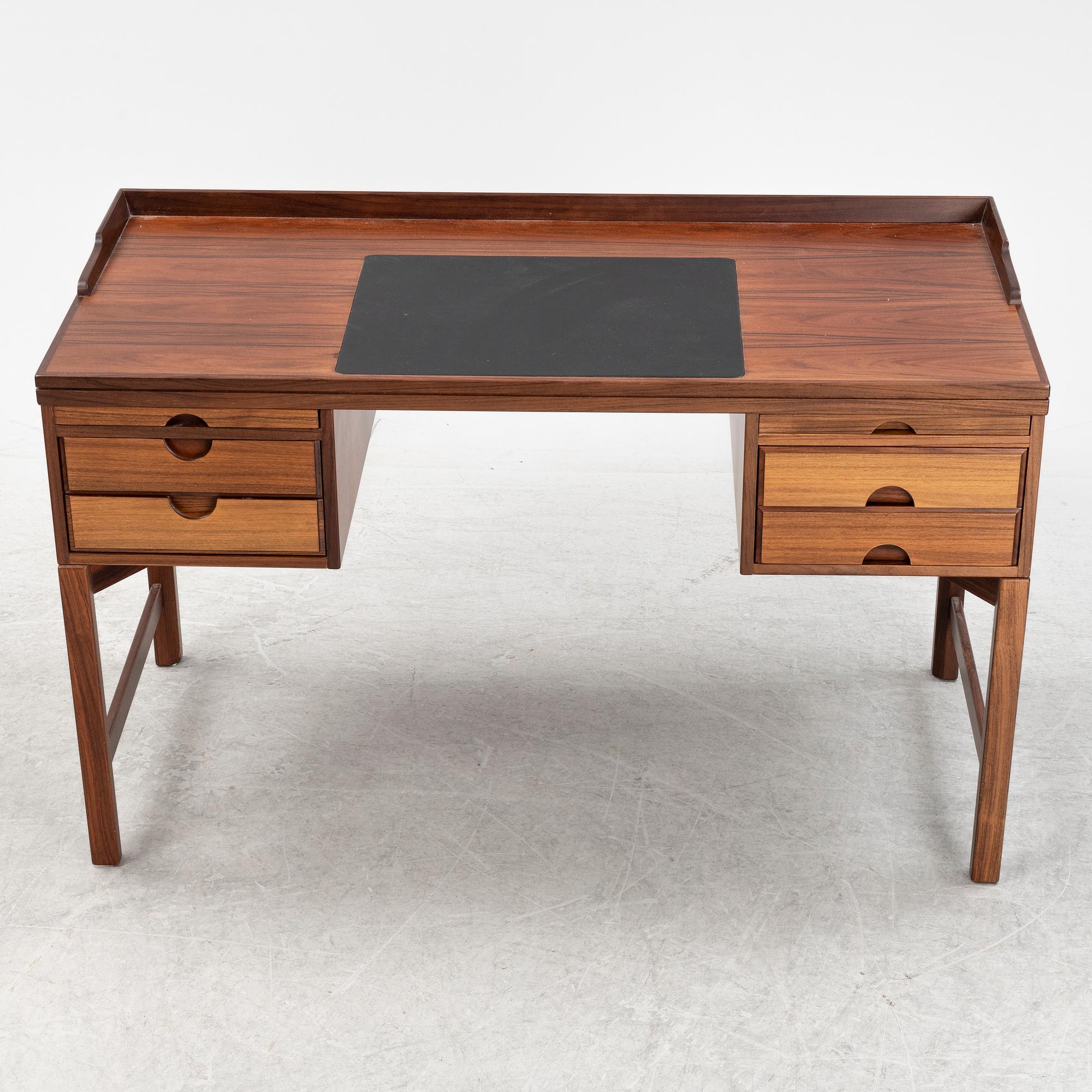 Torbjørn Afdal, a 'Minerva' rosewood desk and a chair, Bruksbo, Haug Snekkeri AS, Norway, 1960's.