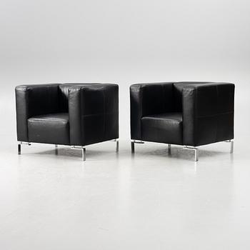 A pair of armchairs, 21st century.