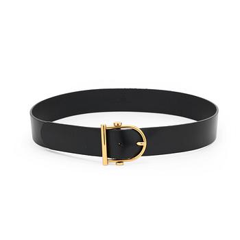 522. GUCCI, a black leather belt.