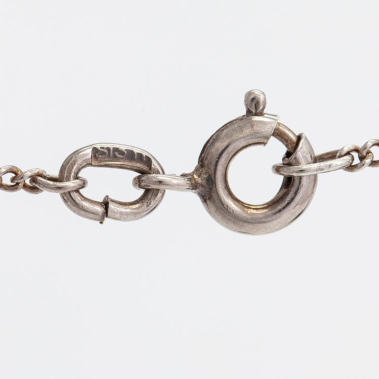 Oskar Pihl, a Lucia 2-pcs necklace/ cross, silver and citrine, Tillander, Helsinki 1951.