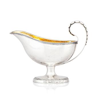 230. A Swedish Gustavian parcel-gilt silver cream-jug, mark of Pehr Zethelius, Stockholm 1792.