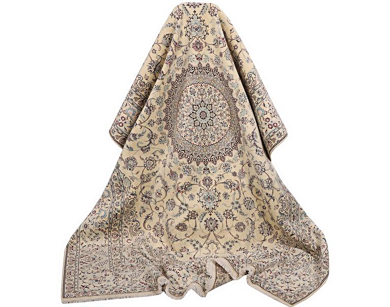 A Nain carpet, part silk, signed, 6 laa, c. 295 x 205 cm.