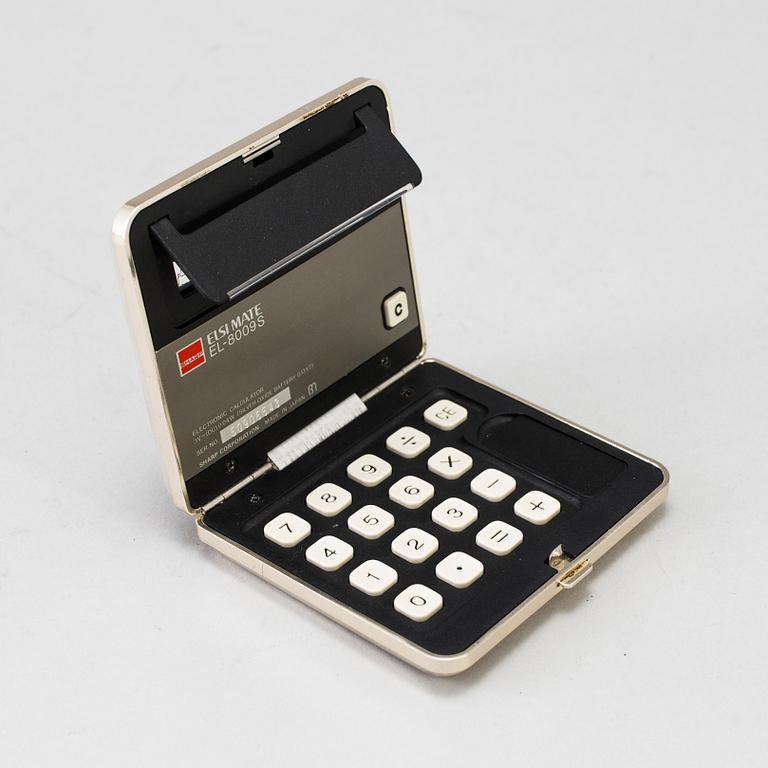 A silver calculator by Tiffany's and cuff link box in silver H.V.P & Co Birmingham 1887.