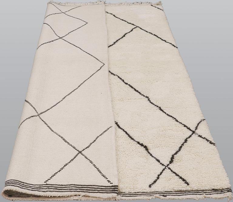 A Maroccan rug, ca 254 x 160 cm.