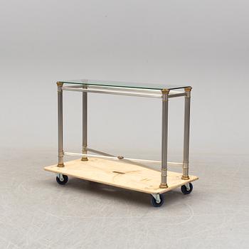 A steel and brass side table, late 20th Century.