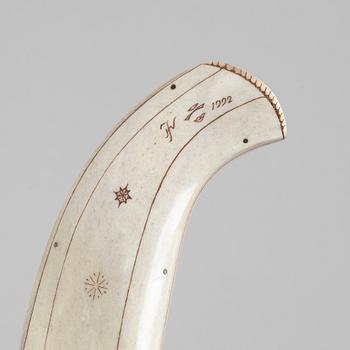 A knife, signed and dated 1992.