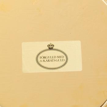 12 brass plates by Skultuna.