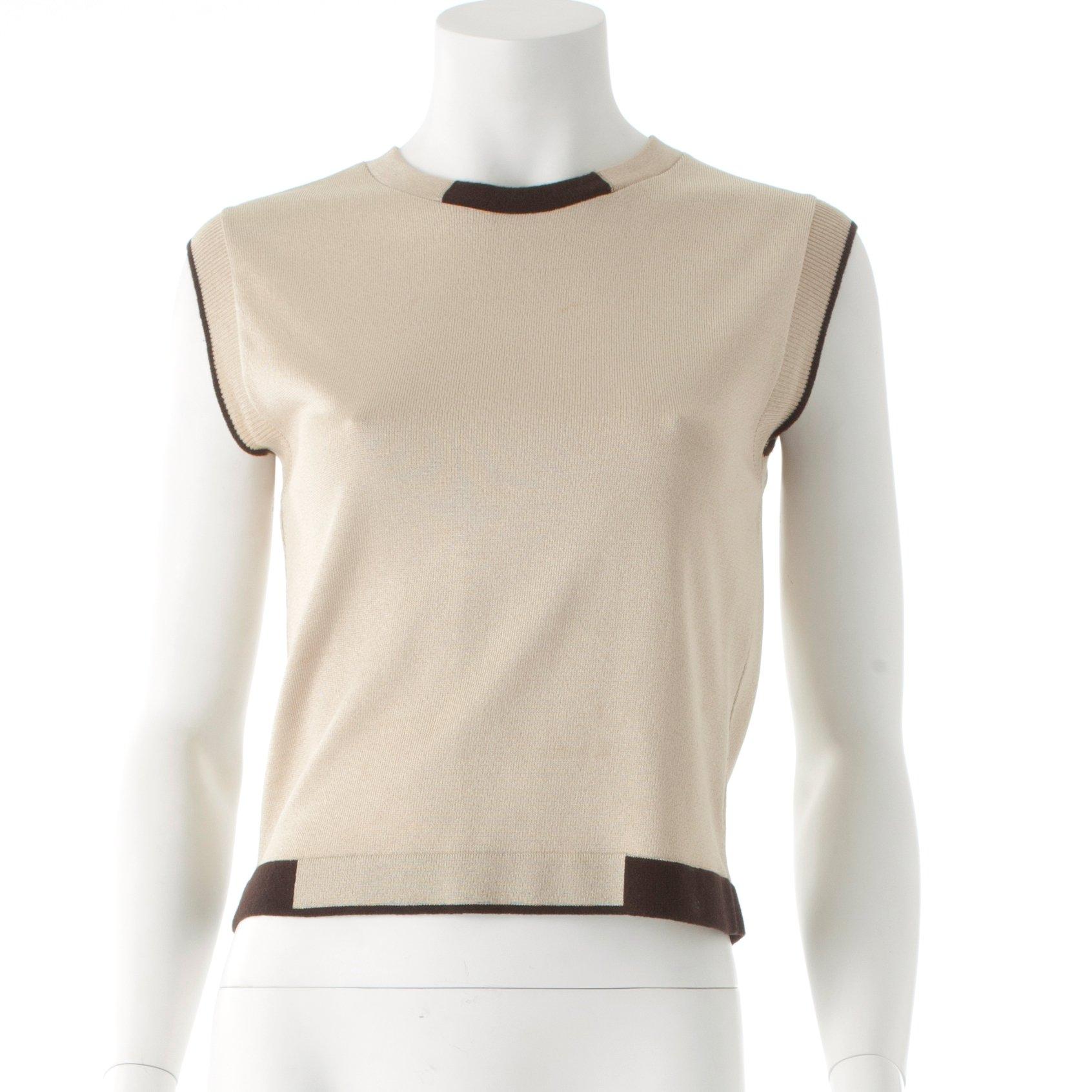 CHANEL, ett tröjset bestående av topp samt cardigan.