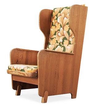 An Axel Einar Hjorth stained pine armchair 'Lovö', Nordiska Kompaniet, Sweden.