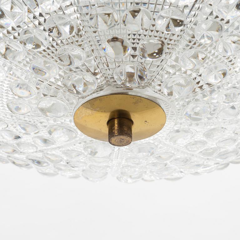 Carl Fagerlund, a glass and brass ceiling light, Orrefors, second half of the 20th Century.