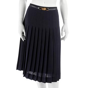 728. CÉLINE, a blue woolblend pleated skirt. Size 44.