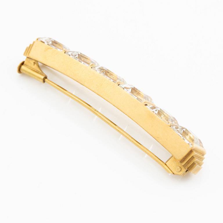 Wiwen Nilsson, a brooch, 18K gold with faceted rock crystal, Lund 1942.