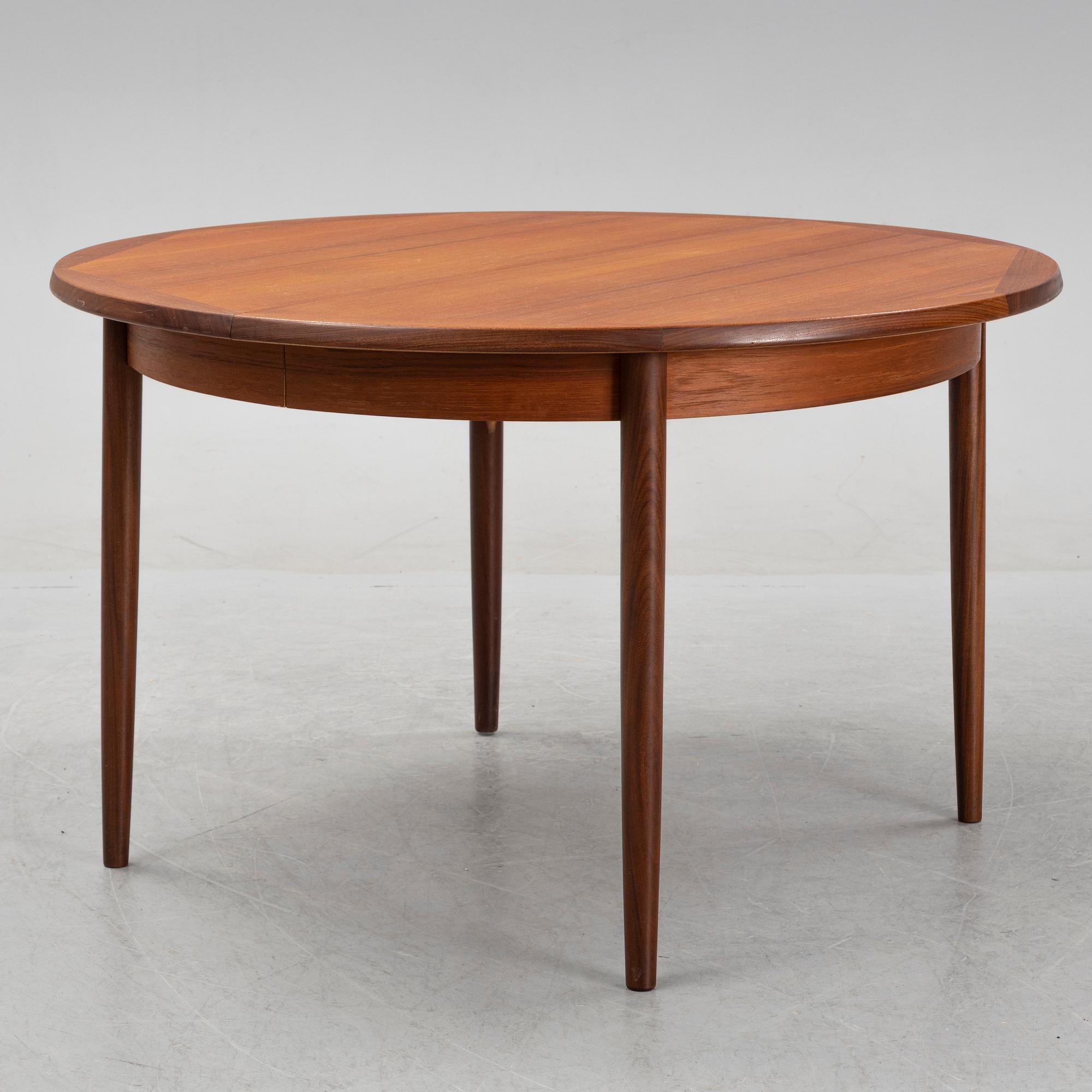A teak 1950's/60's dining table.