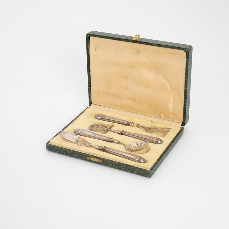 A set of four French silver serving cutlery.