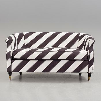 A black and white striped sofa by Rosenhof Art Factory, 21st century.