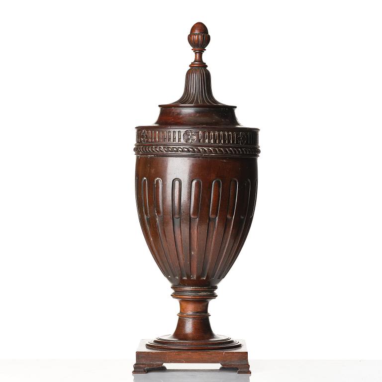 A mahogany carved Urn Cutlery box in George III style, around year 1800.