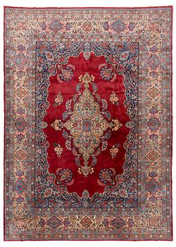 415. A semi-antique Kerman carpet, ca 431 x 312,5 cm.