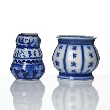 Wilhelm Kåge, a jar with cover, and four vases, creamware and porcelain, Gustavsberg, Sweden, 1917-1920.