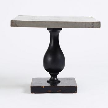 Uno Åhrén, a black lacquered table with a pewter top by Nils Fougstedt, Svenskt Tenn ca 1930. Alva & Gunnar Myrdal Collection.