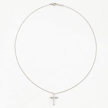 Tiffany & Co, a platinum cross pendant necklace with brilliant-cut diamonds.