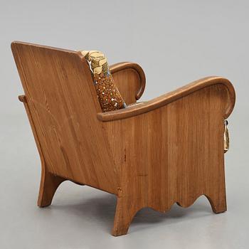 Axel Einar Hjorth, a stained pine "Lovö" armchair, Nordiska Kompaniet, Sweden 1930's.