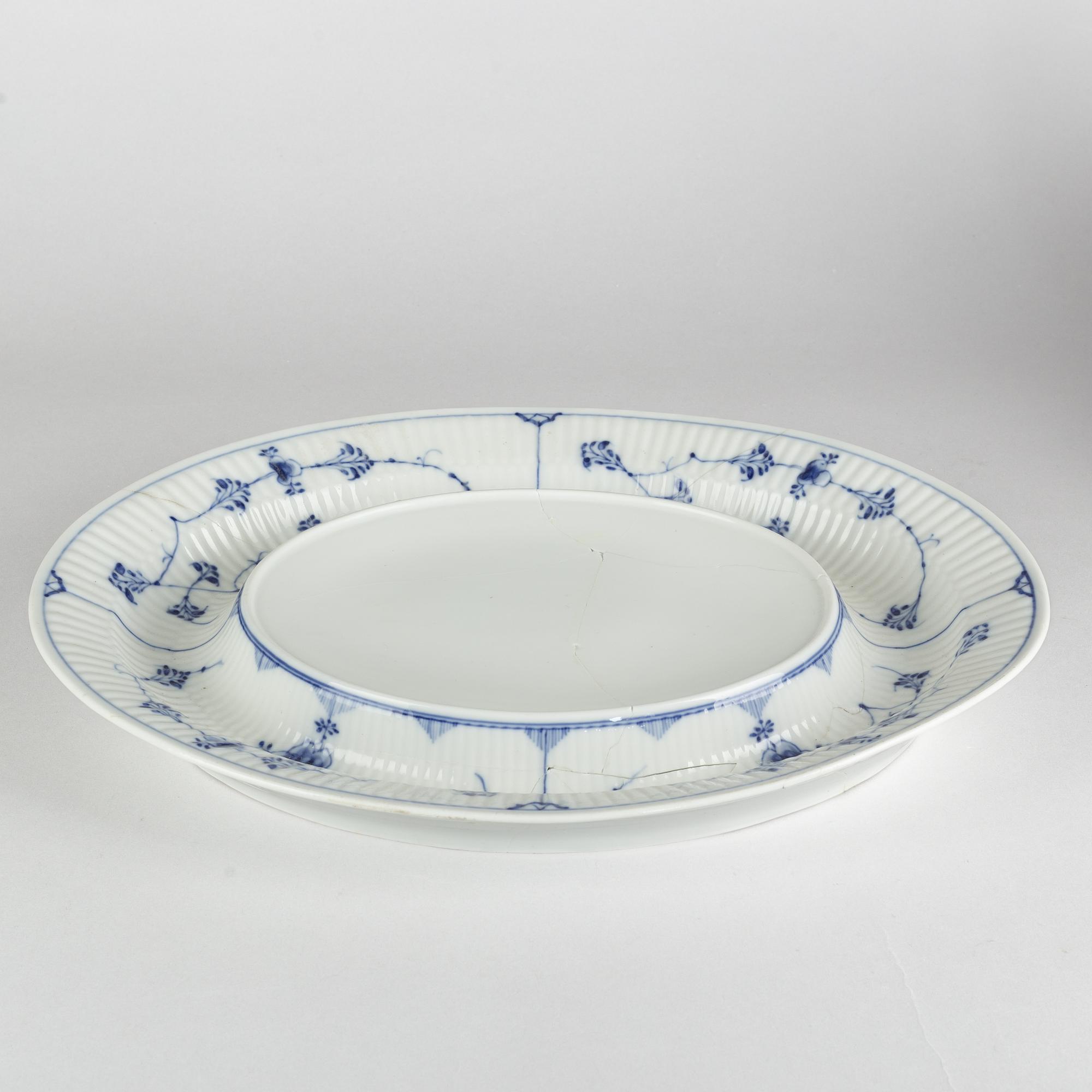 A 'Blue Fluted' porcelain tureen with cover and stand, Royal Copenhagen, early model, 19th century.