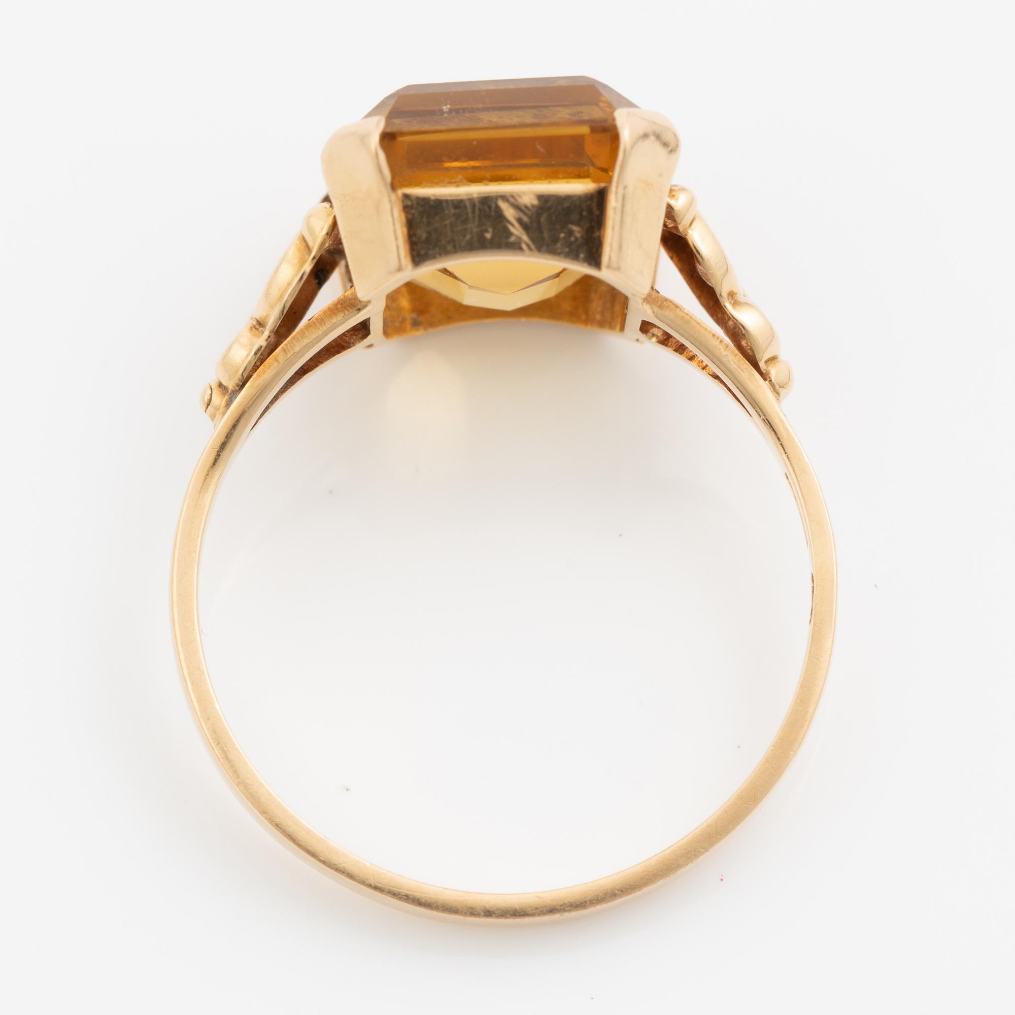 Ring 18K guld med en fasettslipad citrin.