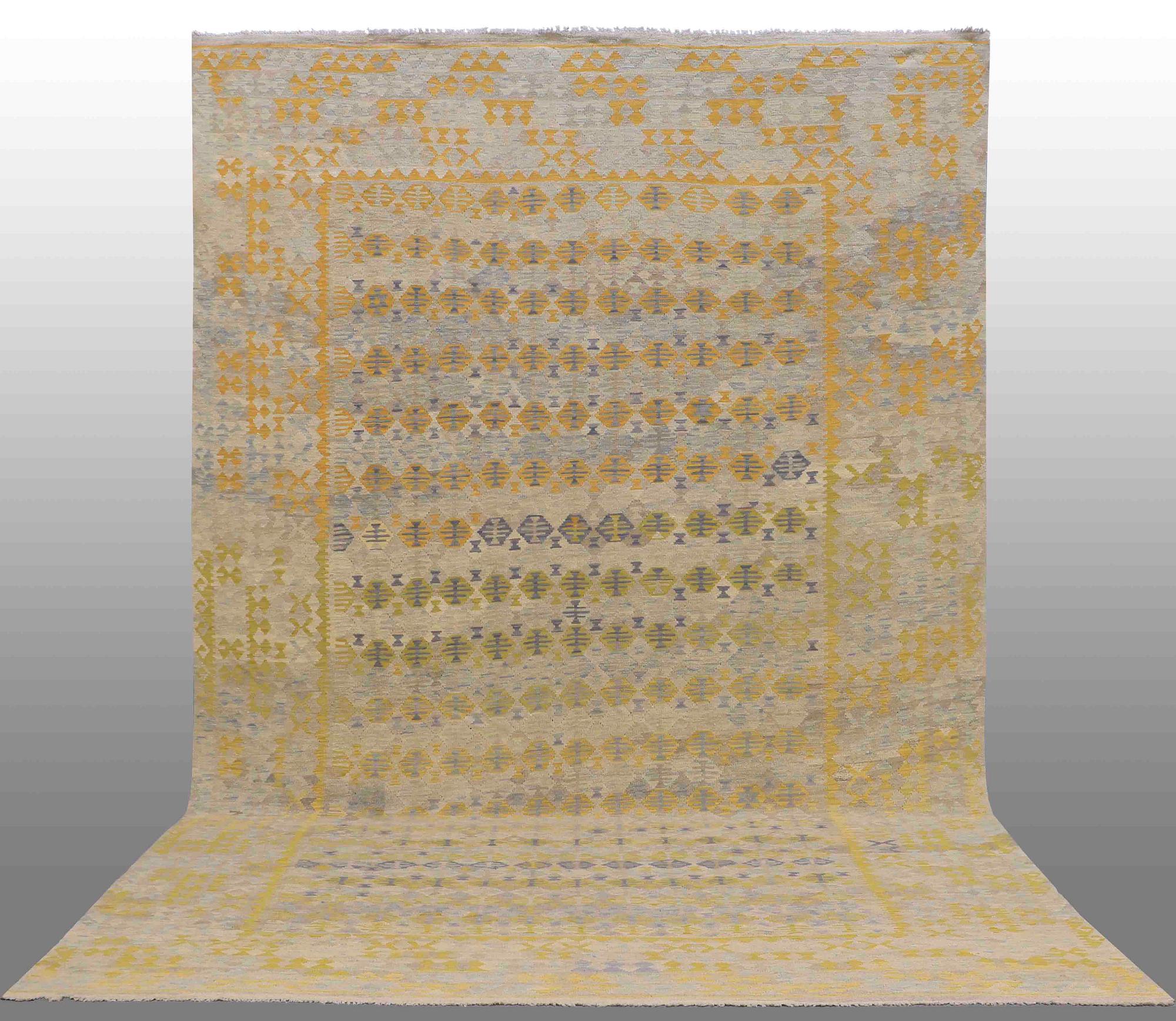 An oriental kilim, around 491 x 308 cm.