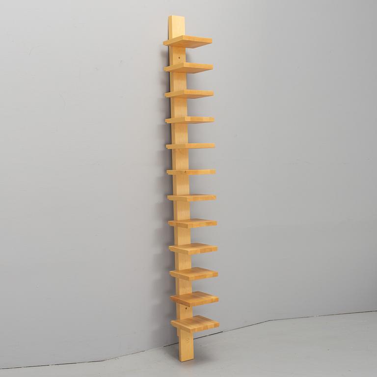 JOHN KANDELL, a "pilaster" wall shelf from the late 1900's.