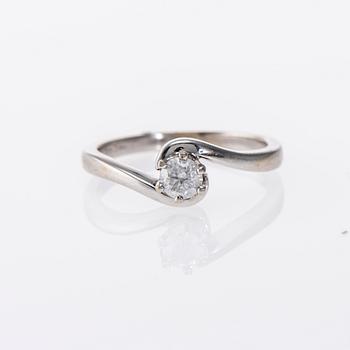 RING, 18K vitguld, ca 0,25 ct. Vikt 3,5 g.